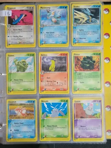 A binder page holding nine EX-era cards in clear sleeves.