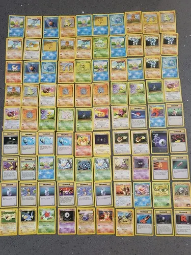 Around ninety Base-set era cards laid out in a large grid.